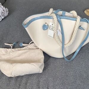 Stunning Urban Expressions cream/sky blue vegan purse with functional dust bag